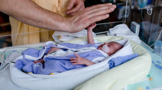 premature baby lies in the heat bed Premature-baby